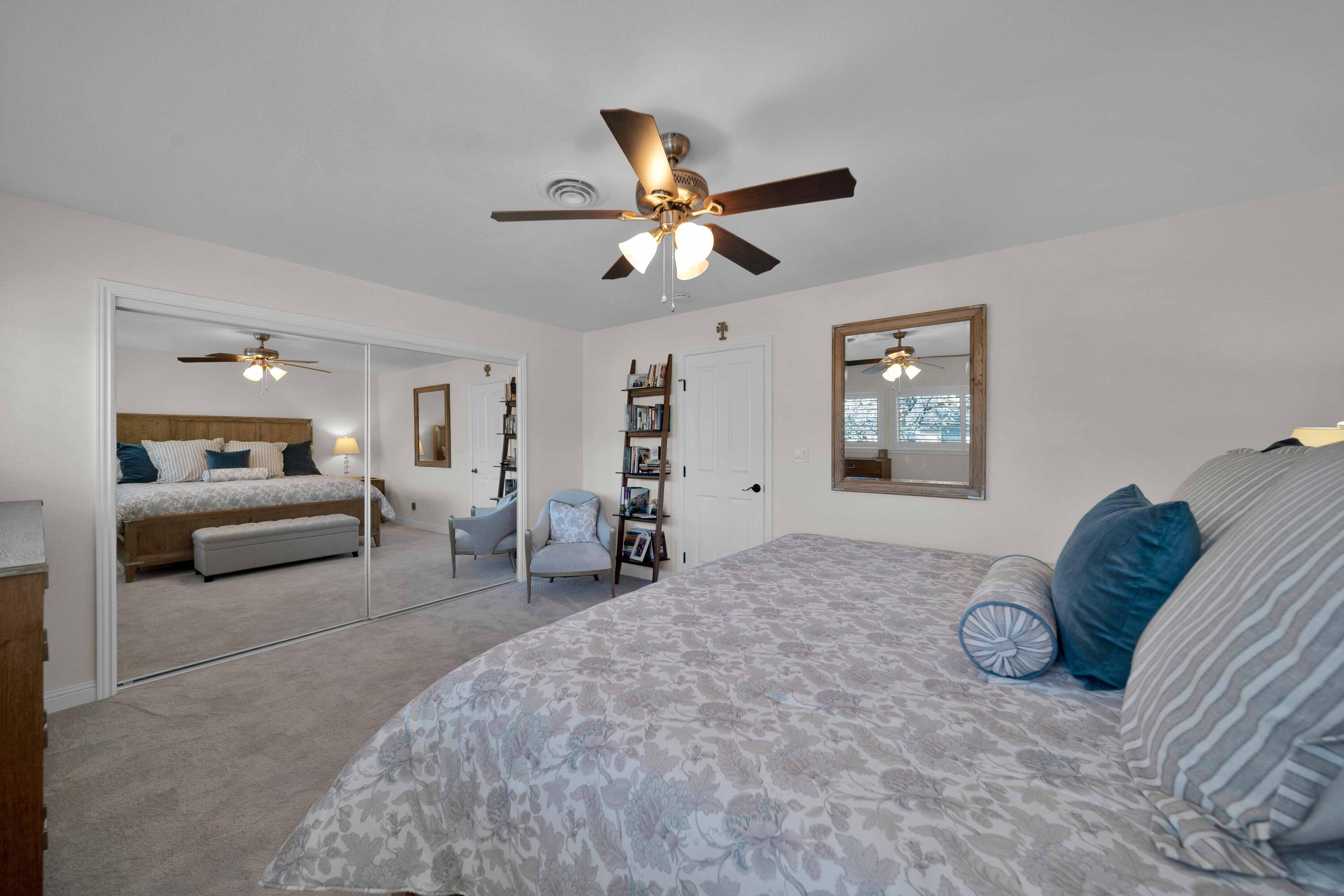 1928 Bechelli Lane Redding, CA 96002 - Photo 29 of 62 a living room with furniture and a chandelier