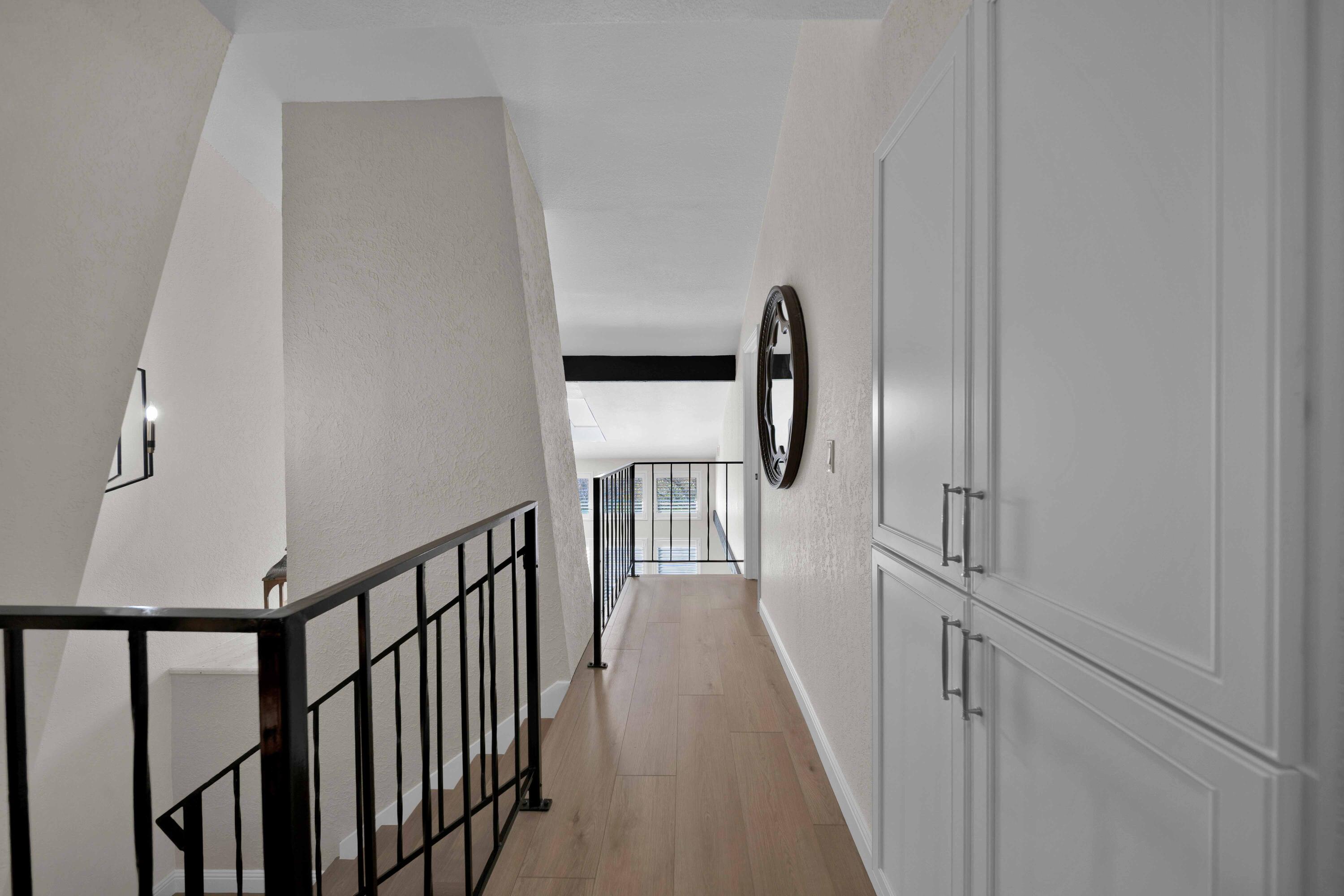 1928 Bechelli Lane Redding, CA 96002 - Photo 31 of 62 a view of a hallway with wooden floor and entryway