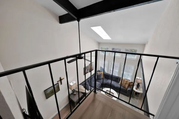 a view of balcony with furniture