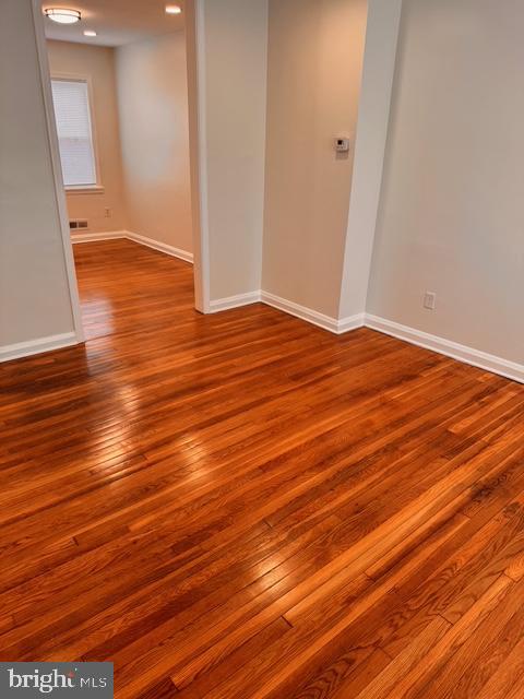 1090 Cameron Road Baltimore, MD 21212 - Photo 5 of 19 a view of empty room with wooden floor