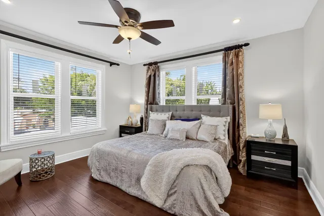 a kitchen with stainless steel appliances a stove a sink and cabinets
