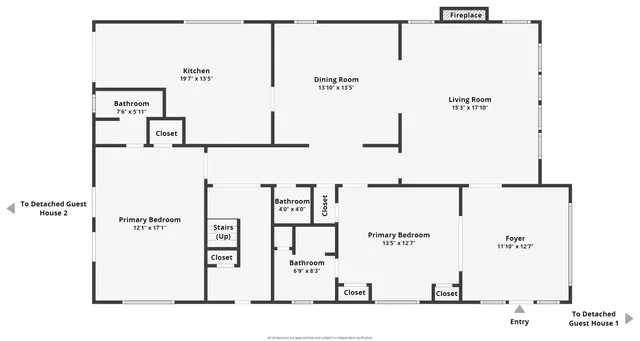 a living room with furniture a fireplace a flat screen tv and a large window