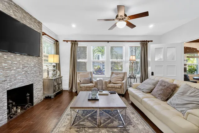 a bedroom with a large bed and a large window