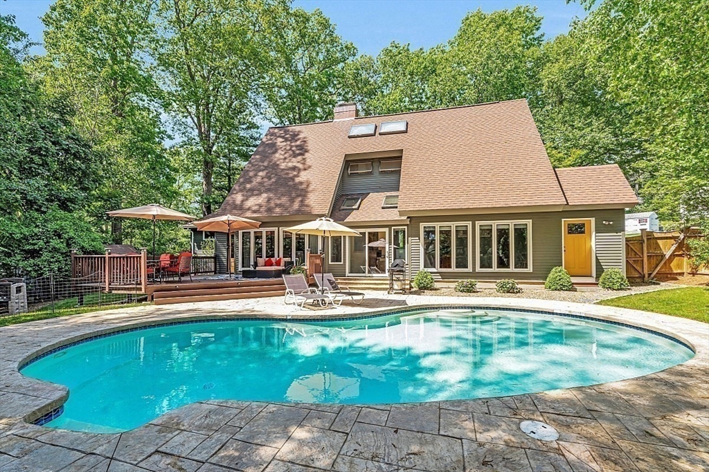 17 Berkshire Road Peabody, MA 01960 - Photo 2 of 41 a view of a house with swimming pool and sitting area