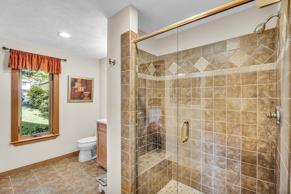 17 Berkshire Road Peabody, MA 01960 - Photo 22 of 41 a bathroom with a shower toilet and sink