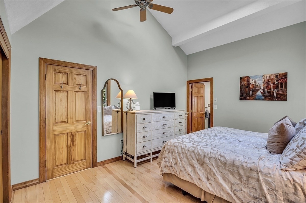 17 Berkshire Road Peabody, MA 01960 - Photo 25 of 41 a bedroom with a bed and a flat screen tv