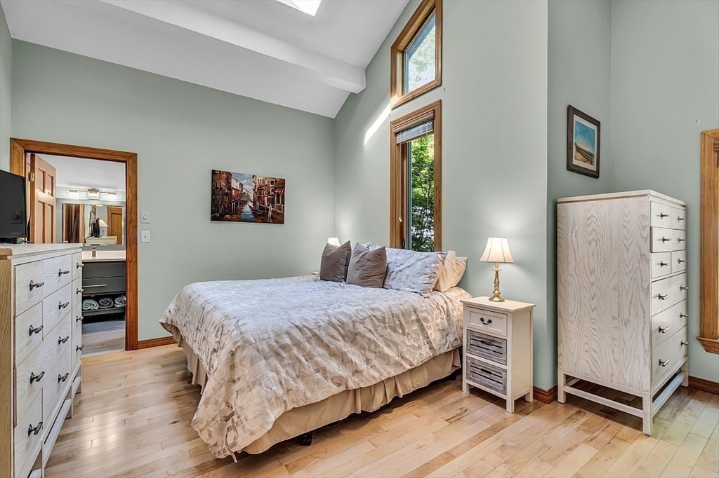 17 Berkshire Road Peabody, MA 01960 - Photo 26 of 41 a bedroom with a bed and wooden floor