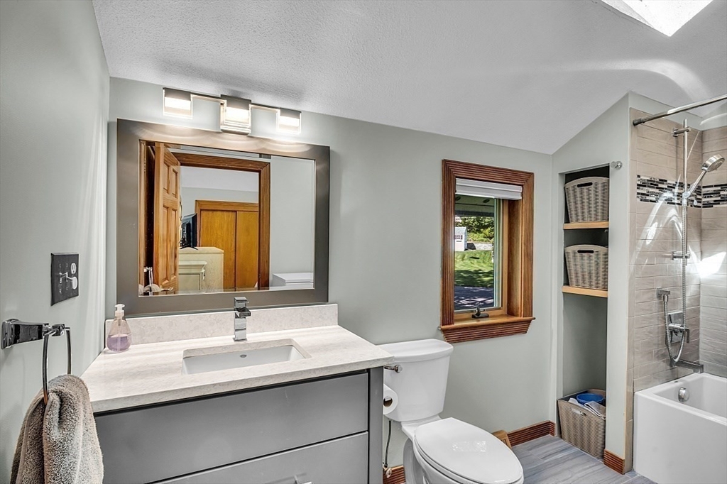 17 Berkshire Road Peabody, MA 01960 - Photo 31 of 41 a bathroom with a sink toilet and shower