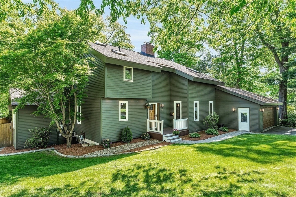 17 Berkshire Road Peabody, MA 01960 - Photo 41 of 41 a front view of house with yard and green space