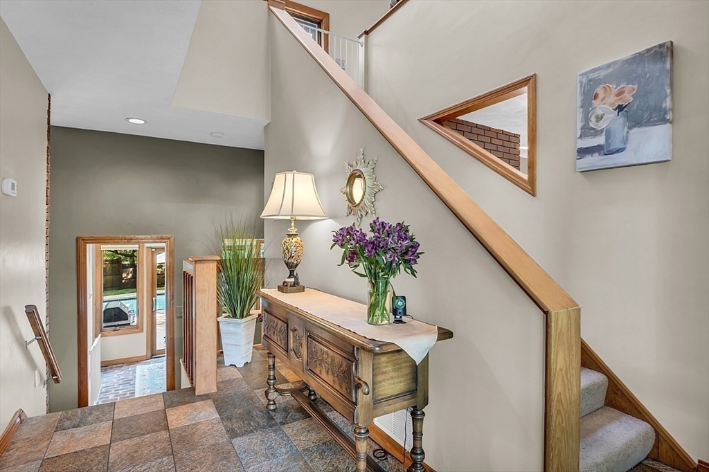 17 Berkshire Road Peabody, MA 01960 - Photo 5 of 41 a living room with furniture and flowers