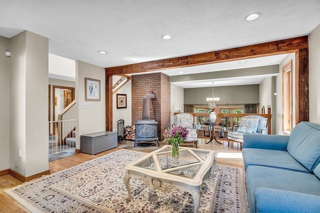 17 Berkshire Road Peabody, MA 01960 - Photo 6 of 41 a living room with furniture and a rug
