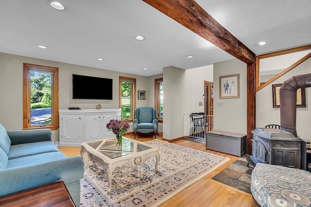 17 Berkshire Road Peabody, MA 01960 - Photo 7 of 41 a living room with furniture and a flat screen tv