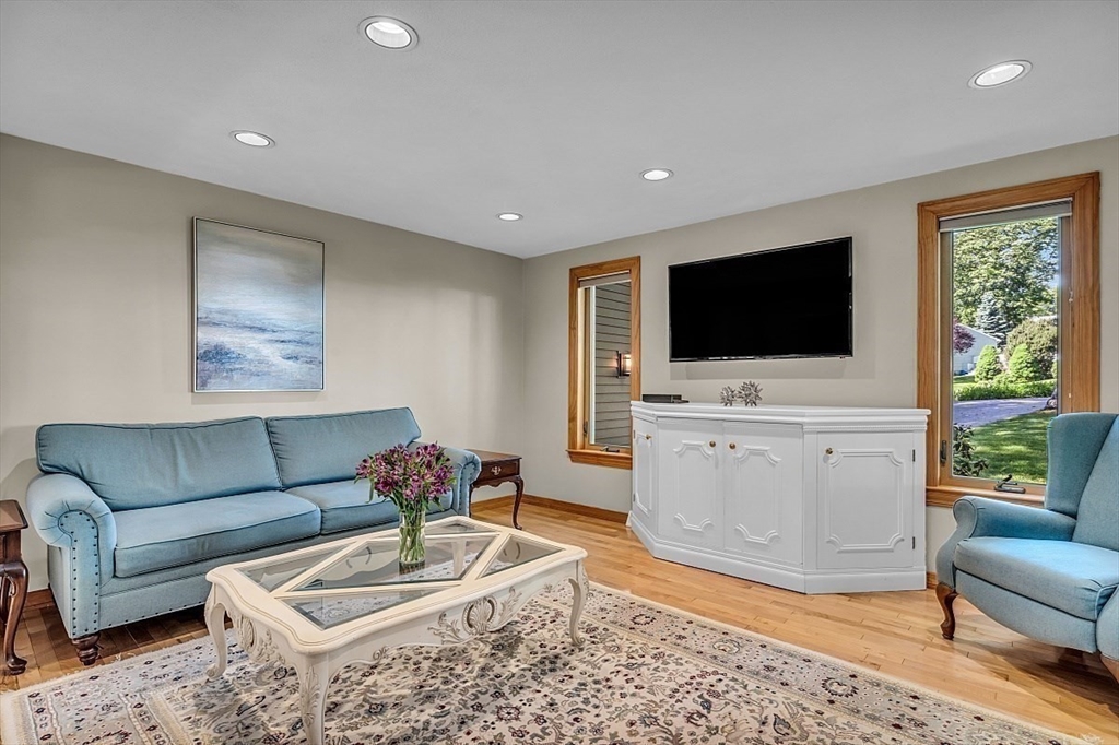 17 Berkshire Road Peabody, MA 01960 - Photo 8 of 41 a living room with furniture and a flat screen tv