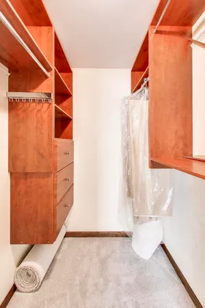 a view of a room with rack and white walls