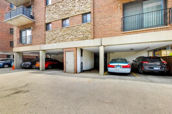 a view of a cars parked in front of a building