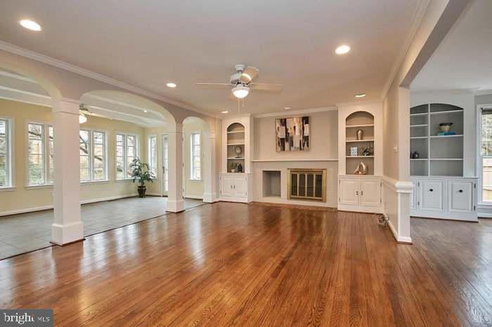1006 Kimberwicke Road McLean, VA 22102 - Photo 16 of 42 a view of an empty room with wooden floor and a window