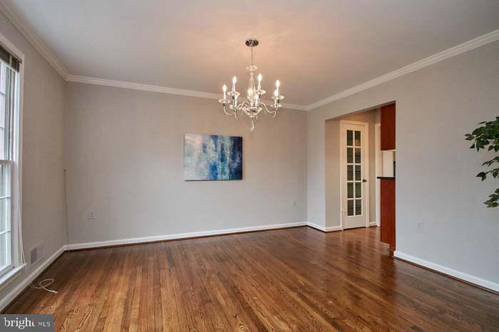 1006 Kimberwicke Road McLean, VA 22102 - Photo 19 of 42 wooden floor in an empty room with a window