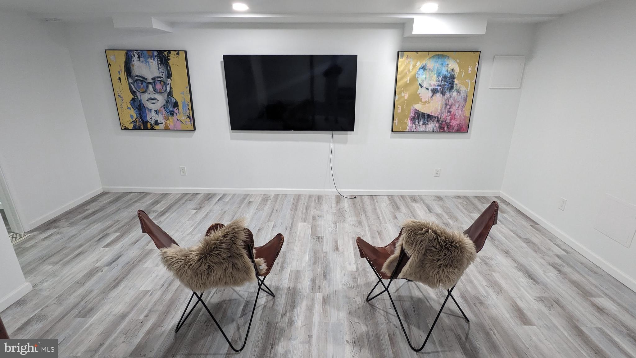 1006 Kimberwicke Road McLean, VA 22102 - Photo 31 of 42 a view of a livingroom with furniture and wooden floor