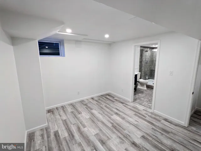 a view of a livingroom with wooden floor