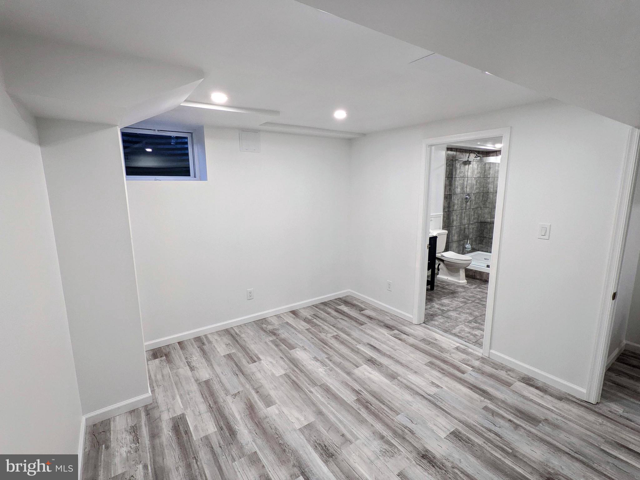 1006 Kimberwicke Road McLean, VA 22102 - Photo 34 of 42 a view of a livingroom with wooden floor