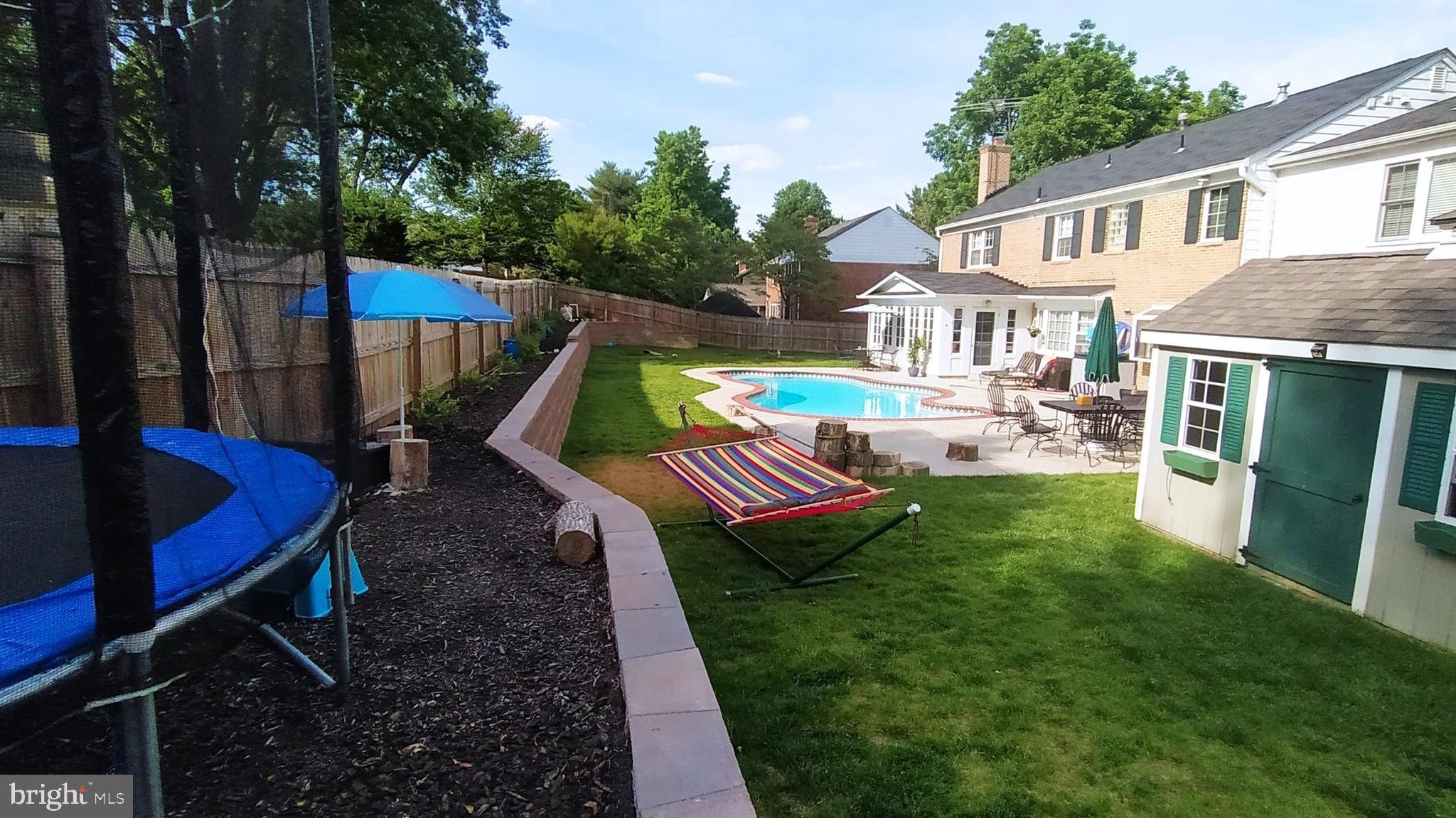 1006 Kimberwicke Road McLean, VA 22102 - Photo 4 of 42 a view of house with a yard
