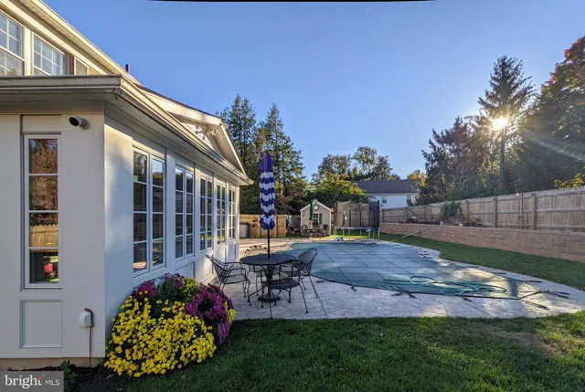 a view of yard with patio
