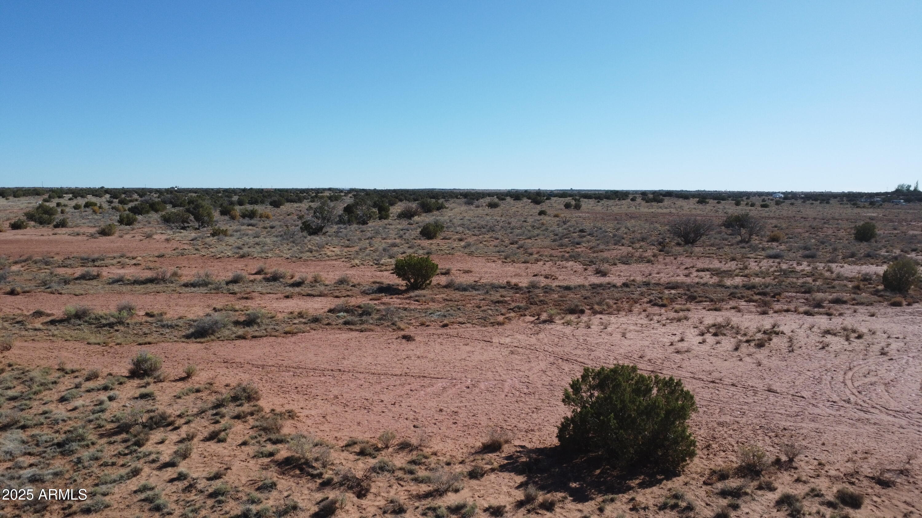 5063 El Dorado Road, Unit 21 Snowflake, AZ 85937 - Photo 5 of 5 a view of a road with a forest