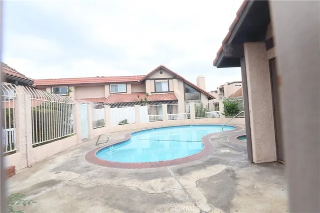 a view of a house with a swimming pool