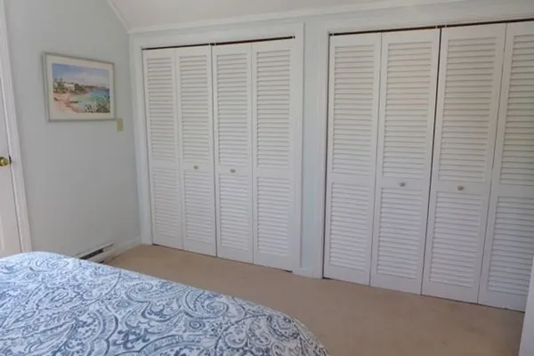 a view of a bedroom with a small space