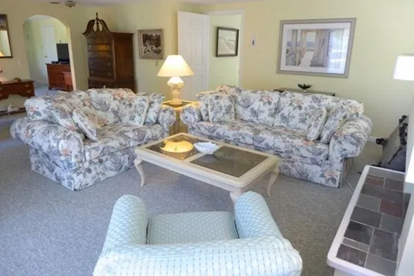 a living room with furniture and a couch
