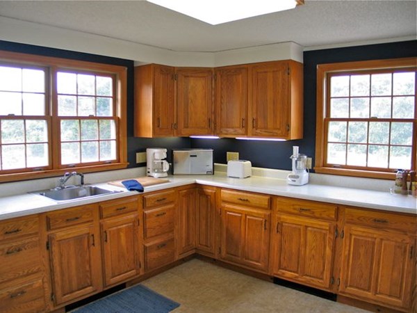 20 Katama Bay Road Edgartown, MA 02539 - Photo 24 of 40 a kitchen with sink and cabinets