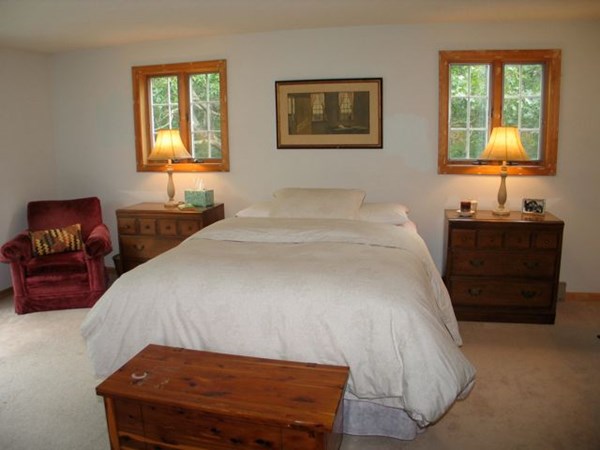 20 Katama Bay Road Edgartown, MA 02539 - Photo 29 of 40 a bedroom with a bed and two windows