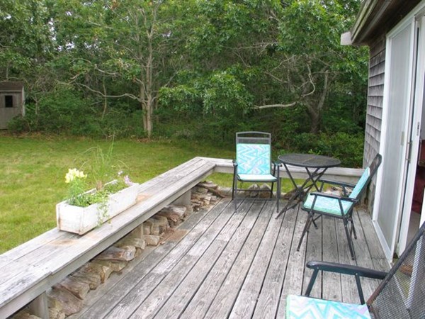 20 Katama Bay Road Edgartown, MA 02539 - Photo 30 of 40 a view of a chairs and table on the terrace