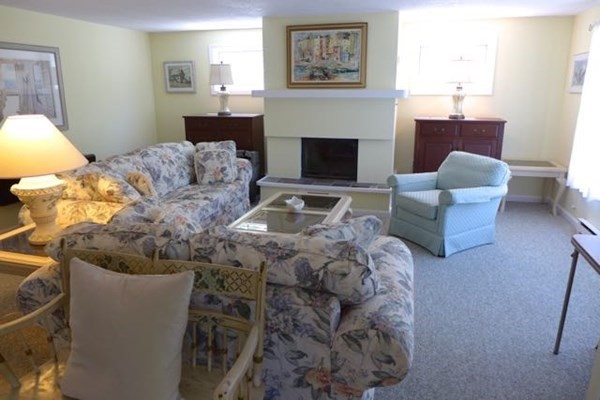 20 Katama Bay Road Edgartown, MA 02539 - Photo 3 of 40 a living room with furniture and a fireplace