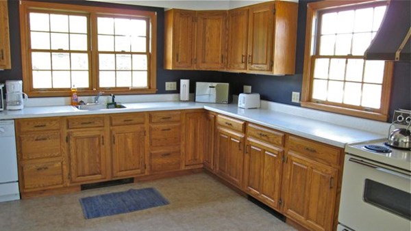 20 Katama Bay Road Edgartown, MA 02539 - Photo 38 of 40 a kitchen with sink cabinets and window