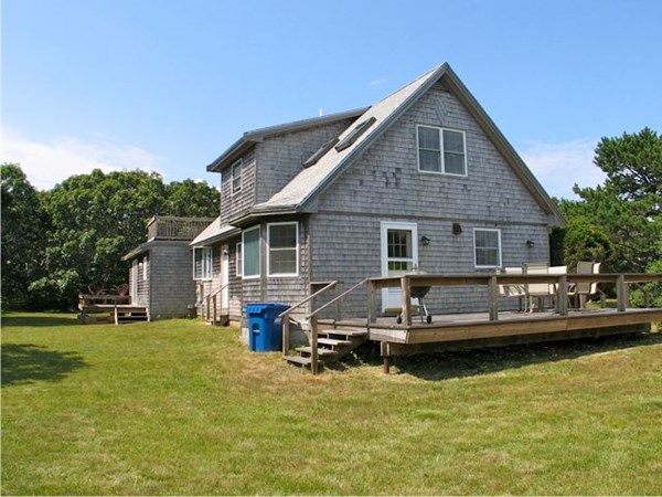 20 Katama Bay Road Edgartown, MA 02539 - Photo 40 of 40 a view of a house with swimming pool next to a yard