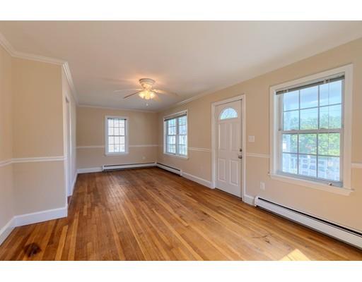 142 East Meadow Road Lowell, MA 01854 - Photo 18 of 28 a view interior of a house with wooden floor and windows