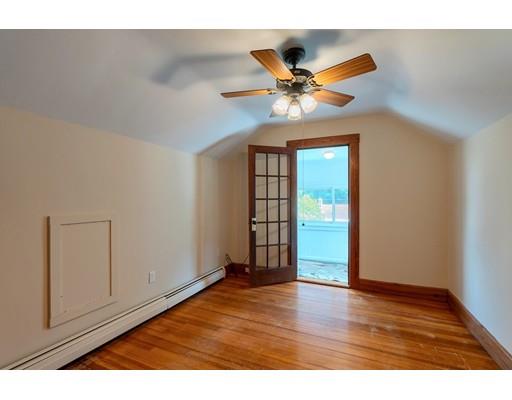 142 East Meadow Road Lowell, MA 01854 - Photo 23 of 28 a view of an empty room with wooden floor