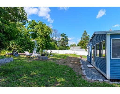 142 East Meadow Road Lowell, MA 01854 - Photo 28 of 28 a view of a house with backyard