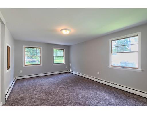 142 East Meadow Road Lowell, MA 01854 - Photo 6 of 28 an empty room with windows