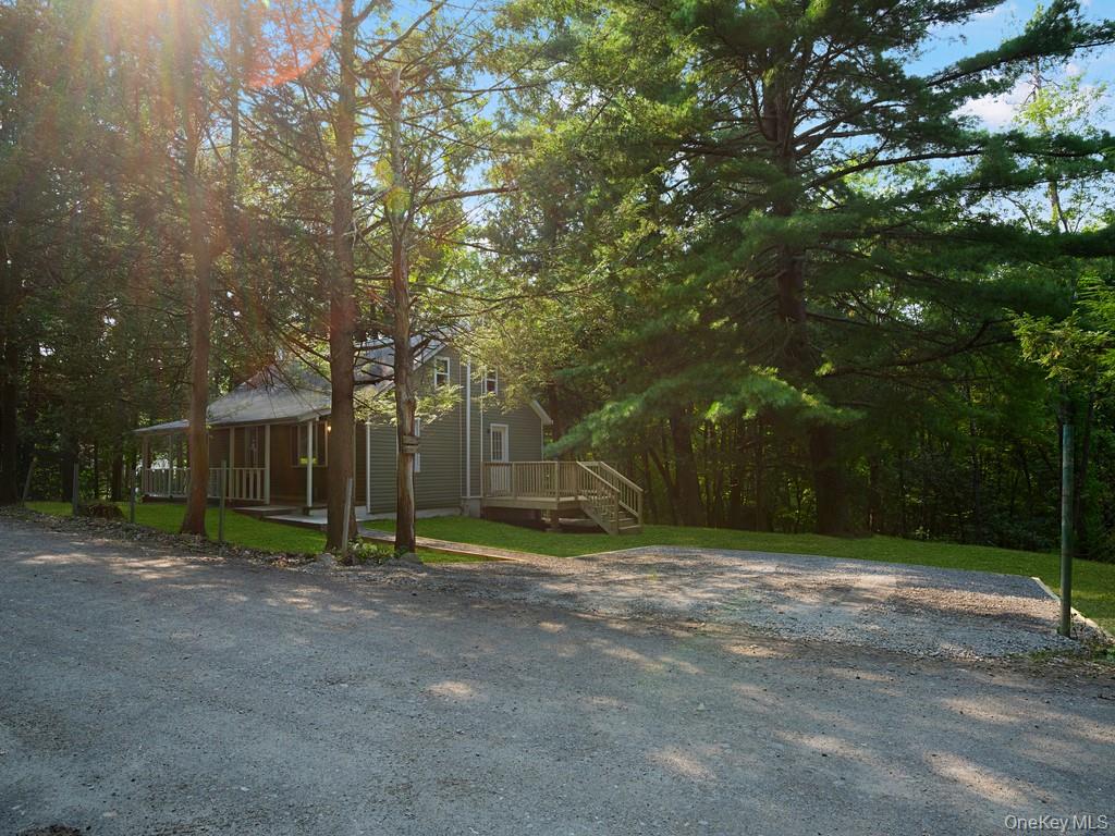 59 Corbin Road Dover Plains, NY 12522 - Photo 16 of 16 a view of outdoor space with deck and tree