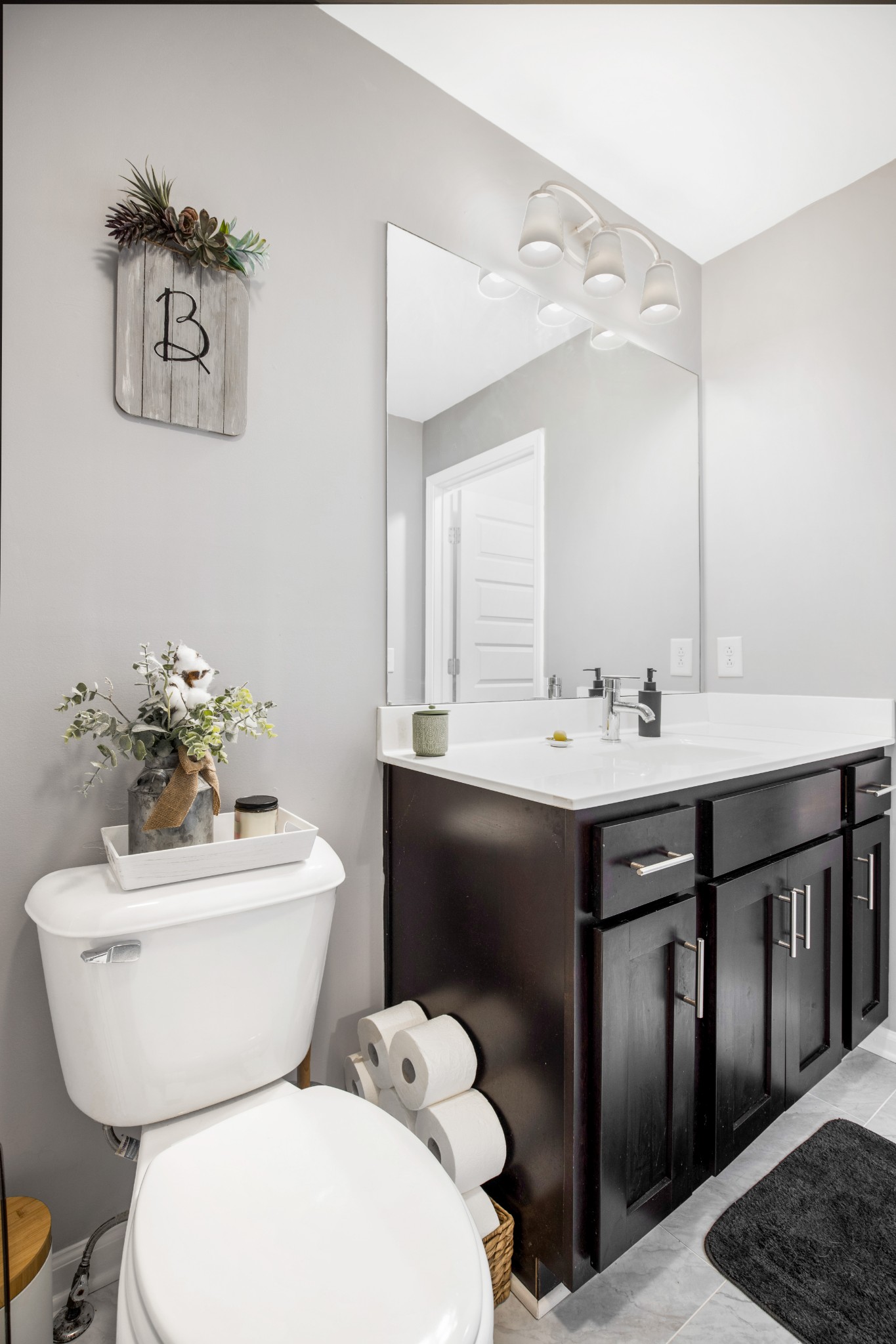 123 Sage Drive Springfield, TN 37172 - Photo 12 of 18 a bathroom with a toilet sink and mirror