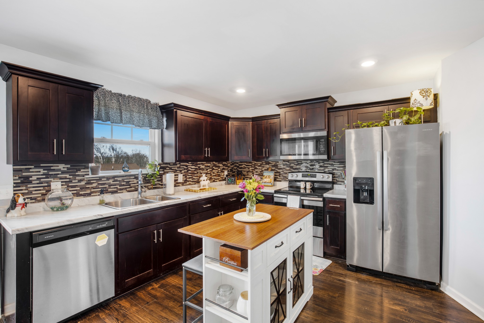 123 Sage Drive Springfield, TN 37172 - Photo 3 of 18 a kitchen with a sink stove and refrigerator