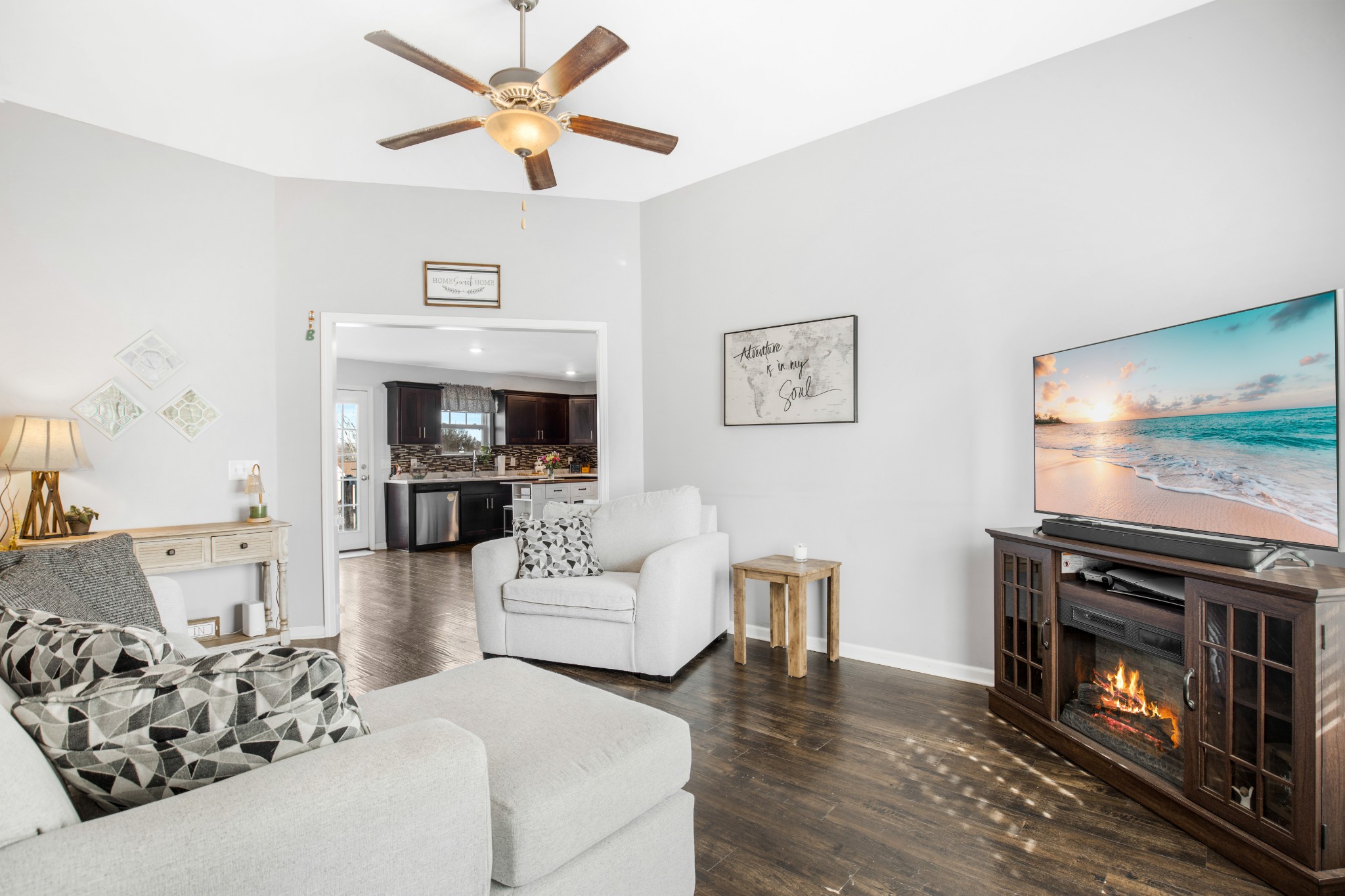 123 Sage Drive Springfield, TN 37172 - Photo 9 of 18 a living room with furniture a fireplace with wooden floor