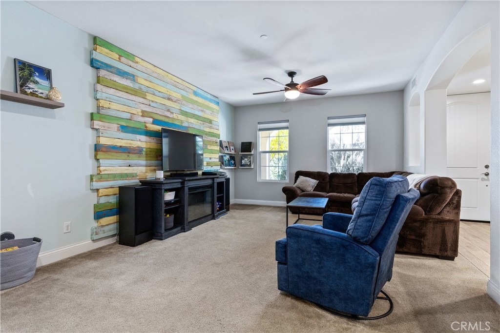 9354 Riberena Circle Atascadero, CA 93422 - Photo 16 of 47 a living room with furniture and a flat screen tv