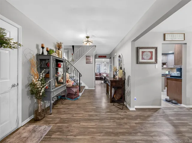 a view of entryway livingroom and hall