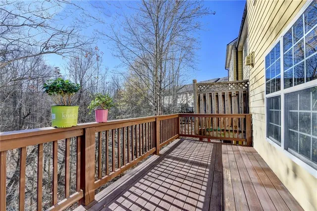 a view of balcony of wooden floor