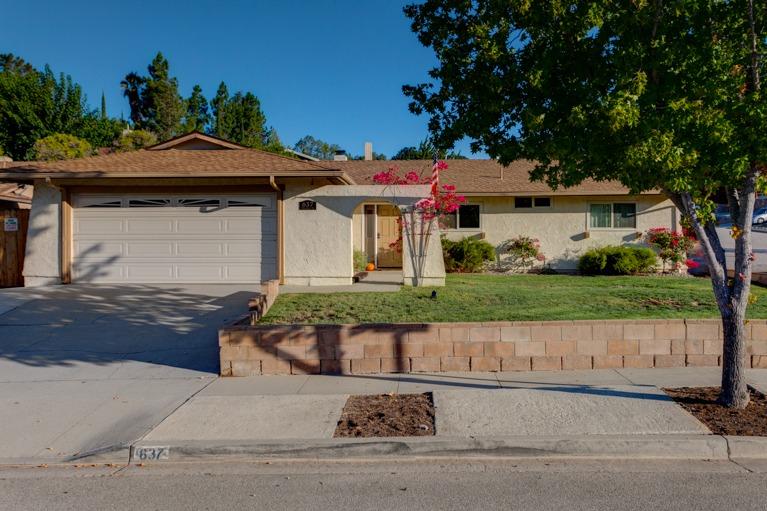 front view of a house with a small yard