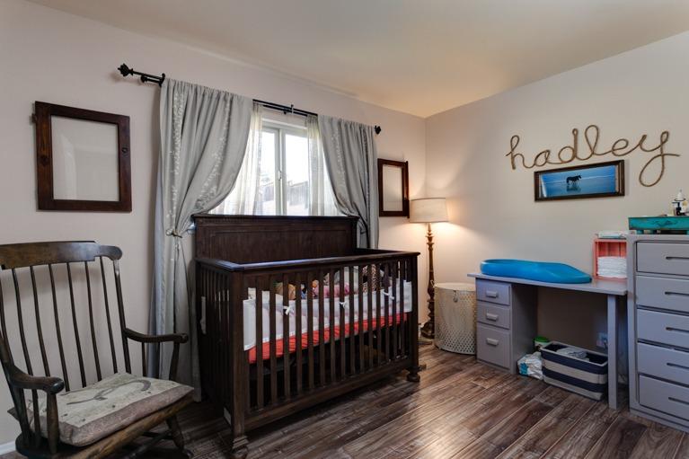 637 Thomas Street Oak View, CA 93022 - Photo 19 of 30 a bedroom with furniture and a window