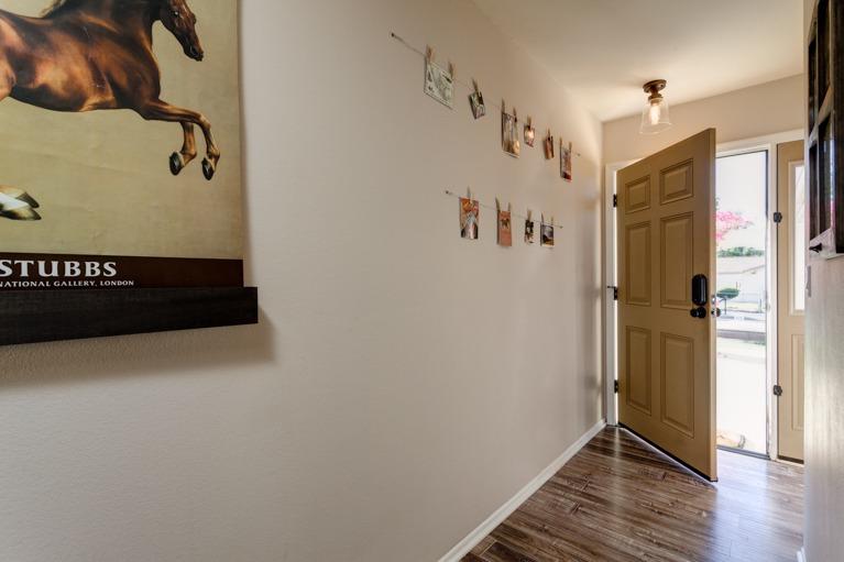 637 Thomas Street Oak View, CA 93022 - Photo 4 of 30 a view of a hallway with wooden floor and closet